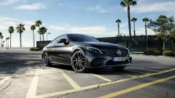The image shows the front of the Mercedes-Benz A-Class. 