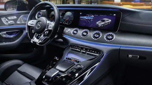 The image shows the cockpit with steering wheel in the A-Class.