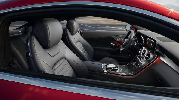 The image shows the interior of the A-Class Sedan. 