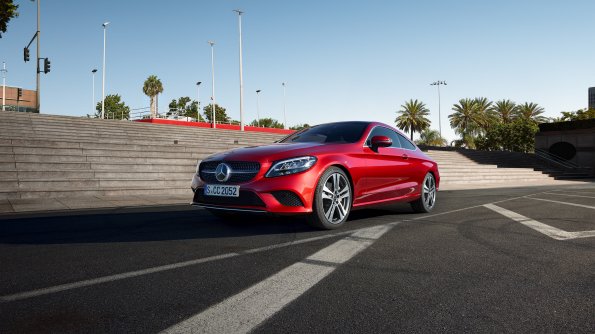 The image shows the A-Class driving in an urban environment. 