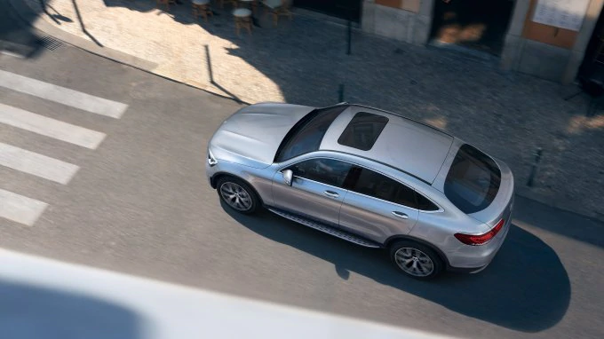 The image shows the A-Class driving in an urban environment.