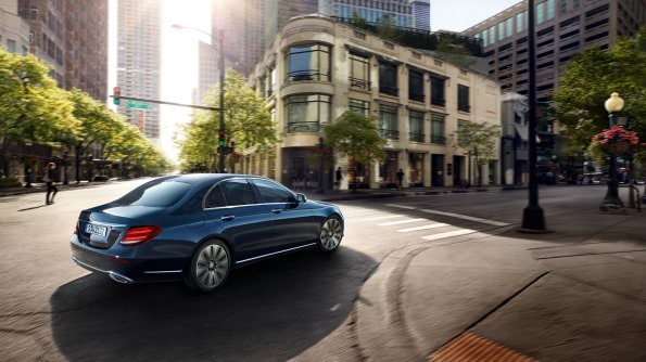 The image shows the A-Class driving in an urban environment.