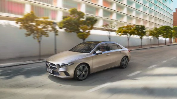 The image shows the A-Class driving in an urban environment.
