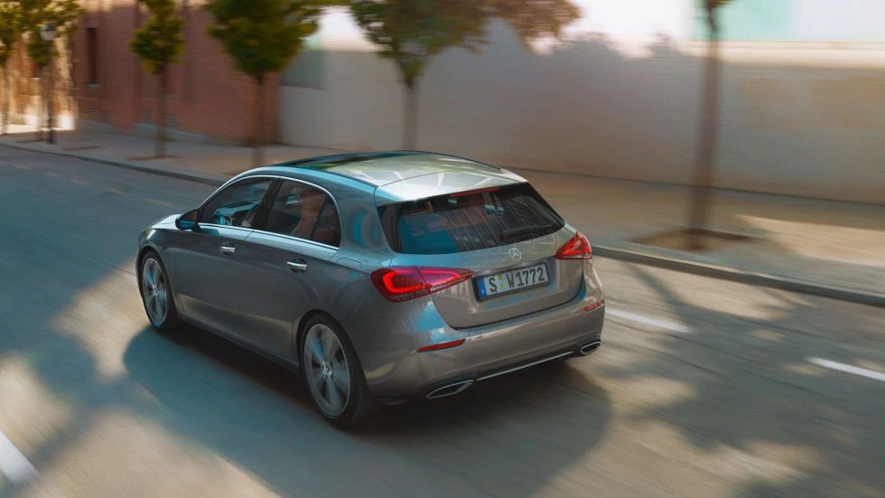 The image shows the A-Class driving in an urban environment.