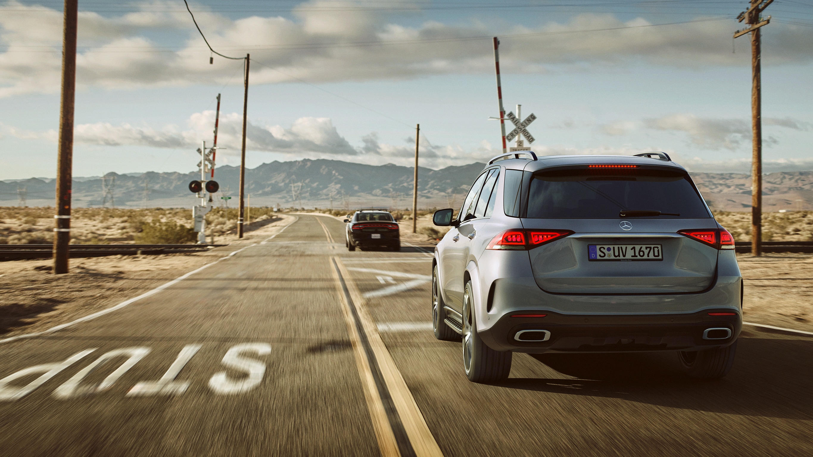 Mercedes‑Benz A‑Class: safety The image shows the A-Class driving in an urban environment.