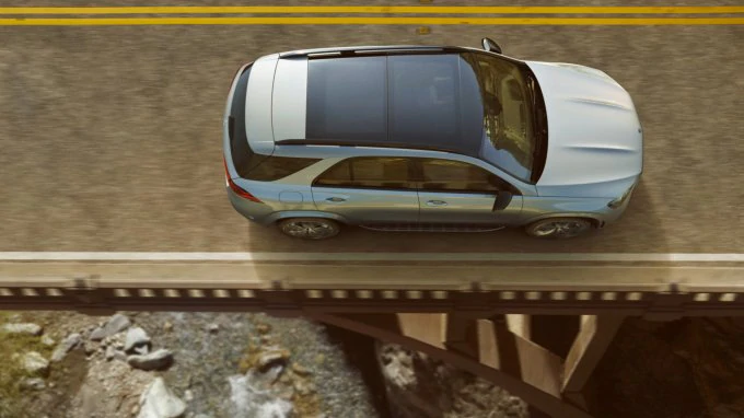Mercedes‑Benz A‑Class: safety The image shows the A-Class driving in an urban environment.